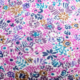 Liberty charity hat. Purple blue brown tine flower print