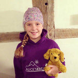 Olivia dressed as her hero, Alice Pyne Liberty hair loss hat